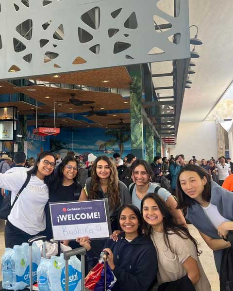 Transport van, behind a person smiling because he found a safe and reliable transport.